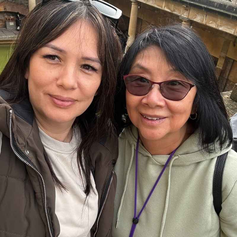 Mother and daughter smiling to camera